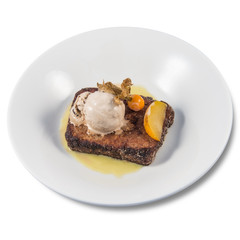 A spanish style French toast with vanilla ice cream
