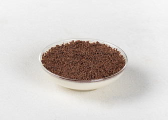 Vanilla Panna cotta, Italian dessert creamy jelly with chocolate chips and chocolate pieces on a light background, tiramisu