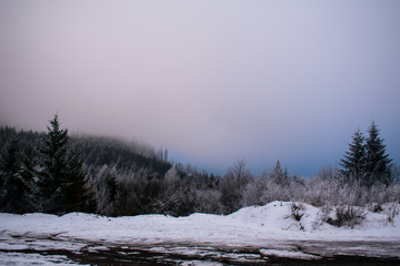 Winter in the mountains. Sky in the clouds. Ukrainian Carpathian Mountains