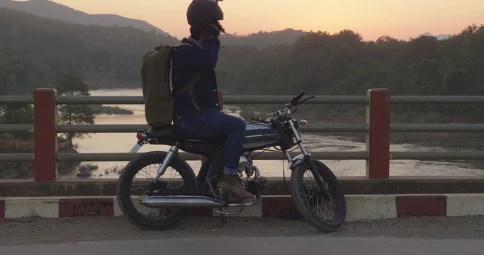 Man Start Motorcycle On The Bridge, Video In 4K