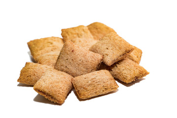 Dietary cereal pads on a white background. A bunch of cereal pads for diet food isolated on a white background