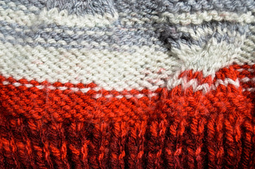 Handmade knitted fabric colored wool background texture