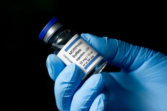 Morphine Sulfate Vial In Gloved Hand