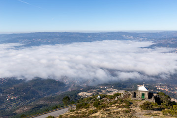 Views from the top of Senhora da Graca Church with Mondim de Basto covered in fog/low clouds