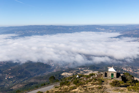Views from the top of Senhora da Graca Church with Mondim de Basto covered in fog/low clouds