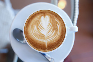 hot latte coffee drink put on table in the morning day