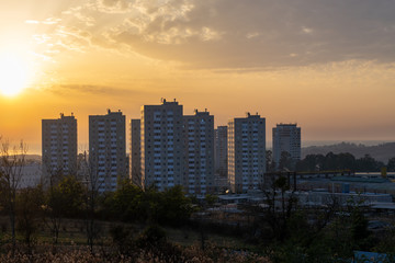 Fototapeta na wymiar City landscape with sunset background.