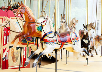 Fototapeta na wymiar carousel horses