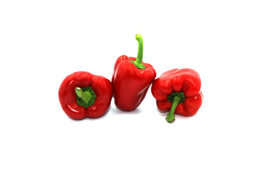 Sweet peppers, colorful vegetables placed on a white background