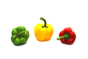 Sweet peppers, colorful vegetables placed on a white background