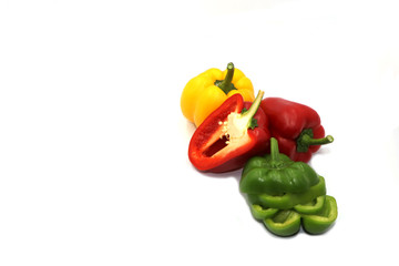 Sweet peppers, colorful vegetables placed on a white background