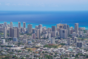 An aerial view of downtown Honolulu, Hawaii with it's skyscraper and high rise buildings.
