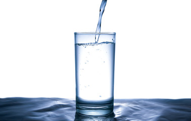 Clean water for good health. Pouring Fresh Pure Water From Pitcher Into A Glass on table wooden. Health And Diet Concept. Lifestyle Healthcare And Beauty.