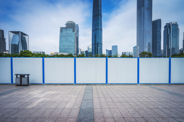 empty, modern square and skyscrapers in modern city