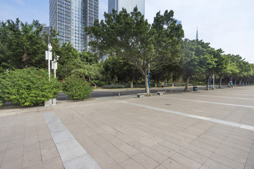 empty, modern square and skyscrapers in modern city