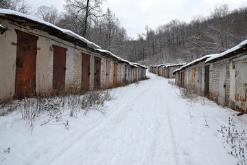 Fototapeta na wymiar Brick sheds on the outskirts of the city district