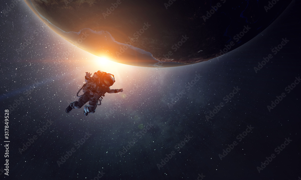 Wall mural exploring outer space. mixed media