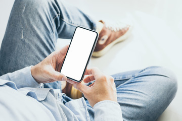 Mockup image blank white screen cell phone.men hand holding texting using mobile. background empty space for advertise text.people contact marketing business and technology