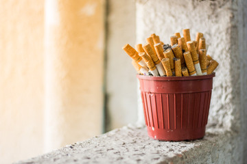 Many cigarettes on the ashtray
