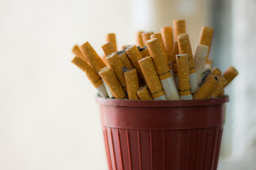 Many cigarettes on the ashtray
