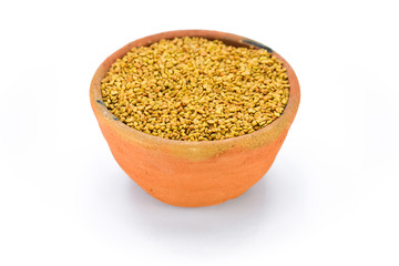 Fenugreek Seeds isolated on white background