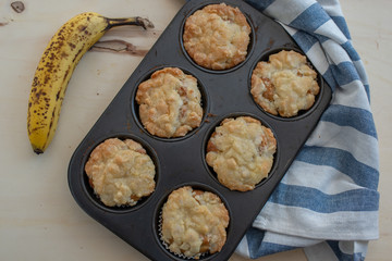 Homemade banana muffins on the wooden table