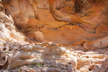 A hollow in a sandstone with a pattern in the form of stone waves. Sandstone Caves, Pilliga National Park, NSW, Australia.