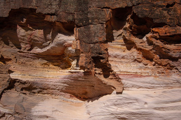 Two arched overhangs and cracked rock surface. Sandstone Caves, Pilliga National Park, NSW, Australia.
