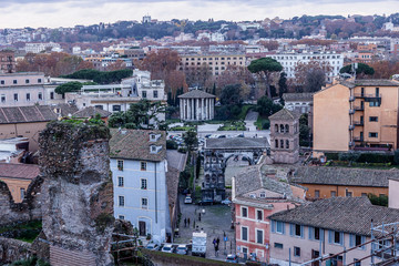 Fototapeta na wymiar Buildings in the historical center, near of Imperial Palace in Rome, Italy. Top view. Aerial view. Panorama.