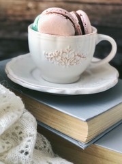 cup of coffee and cookies on wooden table