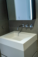 new trendy bathroom sink in an apartment building