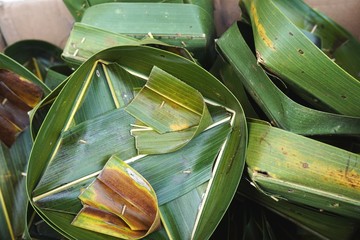 Pile of discarded palm leaf baskets in Bali Indonesia