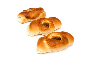 homemade bun with pavidl on a white background, jam in a bun