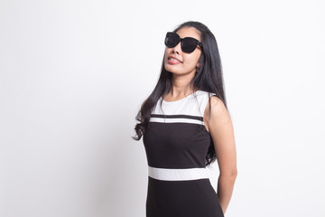 Portrait of a beautiful young asian girl in sunglasses.
