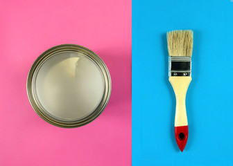 Brush and paint on a blue or pink background