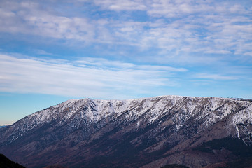 Snow-capped mountain peak and effective clouds.