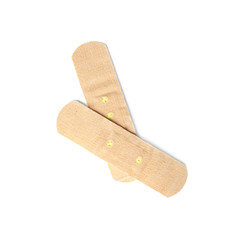 Medical sticking plasters isolated on white. First aid item