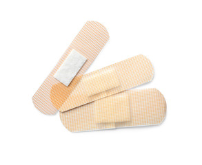 Medical sticking plasters isolated on white. First aid item