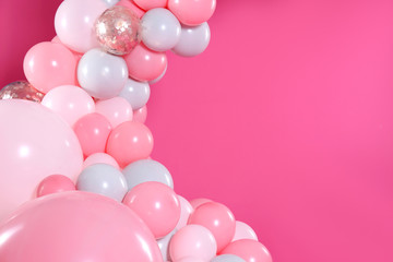 Beautiful composition with balloons on pink background. Space for text
