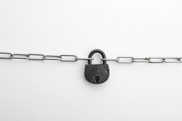 Steel padlock and chain isolated on white, top view. Safety concept