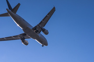 Close view to landing passenger jet