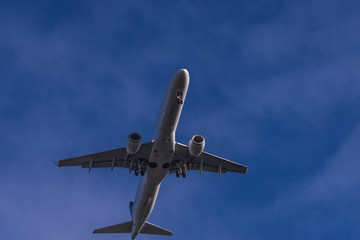 Close view to landing passenger jet