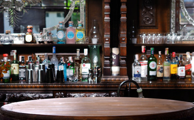 Wooden table blur bar alcohol background.