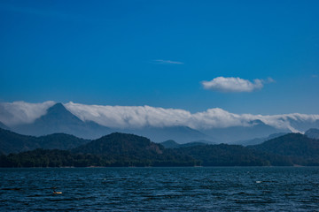 mountains, clouds and blue lake