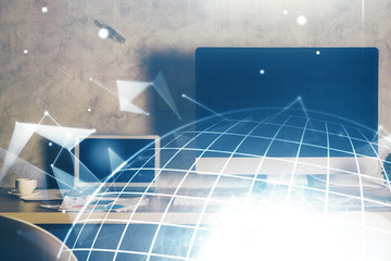 Multi exposure of table with computer and world map hologram. International data network concept.