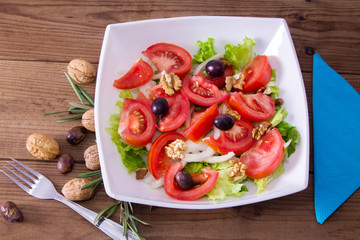 vegetable salad with nuts and olives