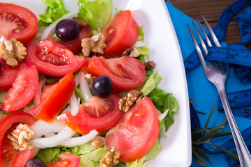 vegetable salad with nuts and olives