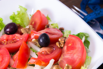 vegetable salad with nuts and olives