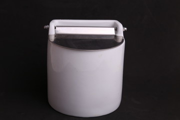 White ceramic salt shaker in color background