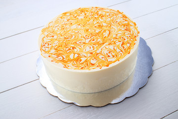 Mousse cake with mango puree and cream